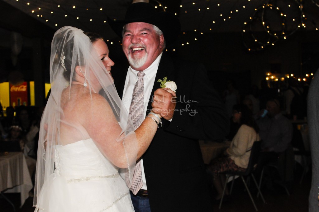 father and daughter dance at  Millarville Racetrack