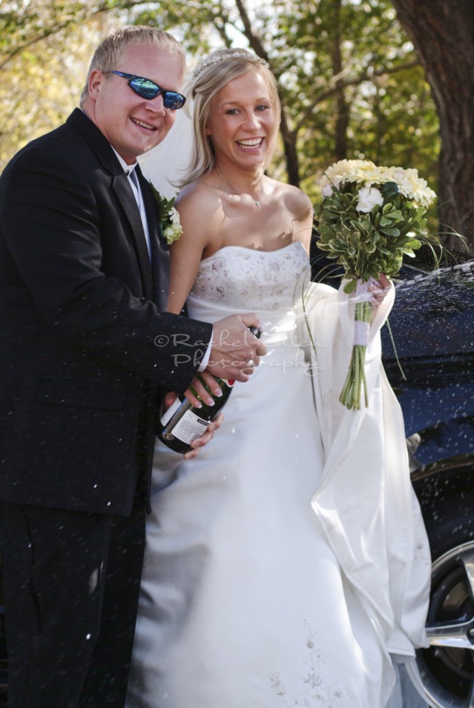 wedding couple celebrating with champagne