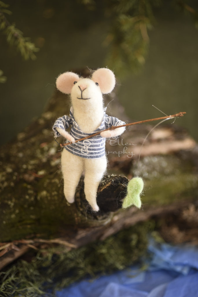 felted mouse fishing in pond